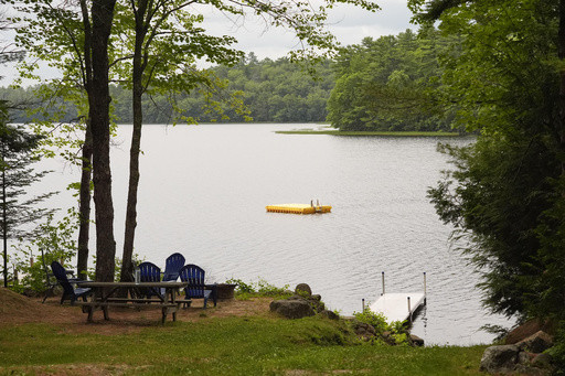 Police arrest teen in connection with a paddleboarder’s killing in a pond in rural Maine