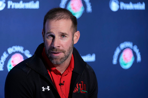 Morgan Scalley promoted from defensive coordinator to head coach at Utah, succeeding Whittingham