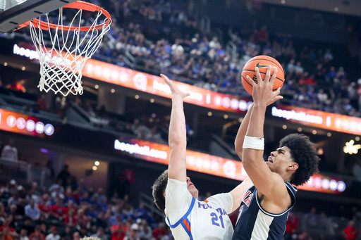 Freshman Koa Peat leads No. 13 Arizona to 93-87 win over defending champion, No. 3 Florida