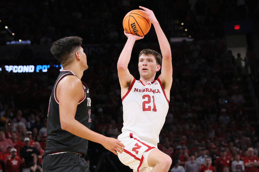 Nebraska gets its first NCAA Tournament win, beating Troy 76-47 behind Pryce Sandfort’s 23 points