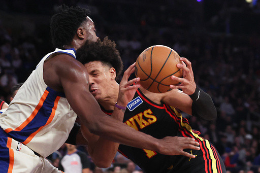 Johnson has another triple-double and the Hawks beat the Knicks 111-99