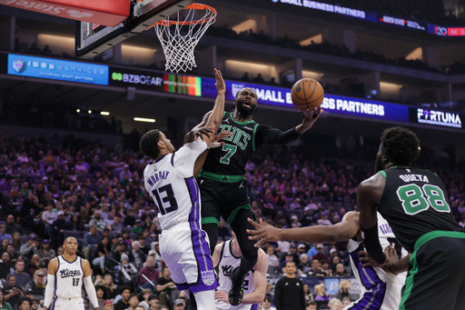 Brown scores 29 points and Celtics pull away in 4th quarter for 120-106 win over Kings