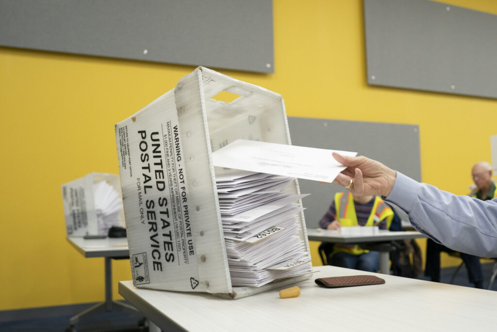 Postal Service moves ahead with mail ballot rule amid court battle