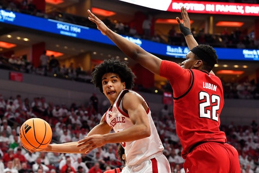 Louisville’s Brown has record-setting game, passing Flagg’s ACC mark, tying Hall of Famer Unseld