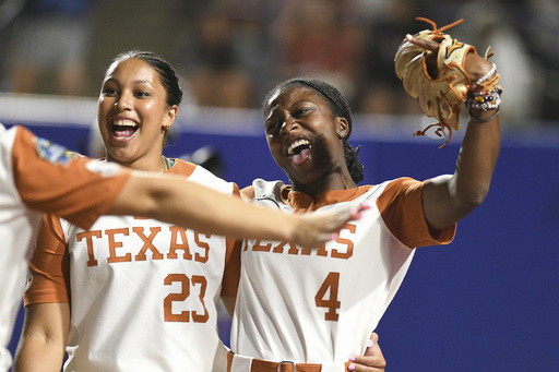 Atwood’s hit on intentional walk attempt gives Texas a 2-1 win over Texas Tech in WCWS finals opener