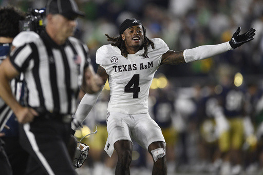Texas A&M jumps to No. 10 in the AP Top 25, Notre Dame is the first ranked 0-2 team since 1988