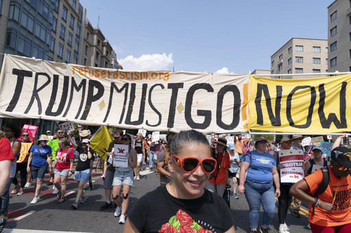 Thousands protest for a ‘Free DC’ on the fourth week of federal control in Washington