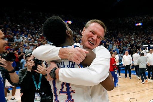 No. 9 Kansas beats top-ranked Arizona 82-78 for 8th straight win, back in contention in Big 12