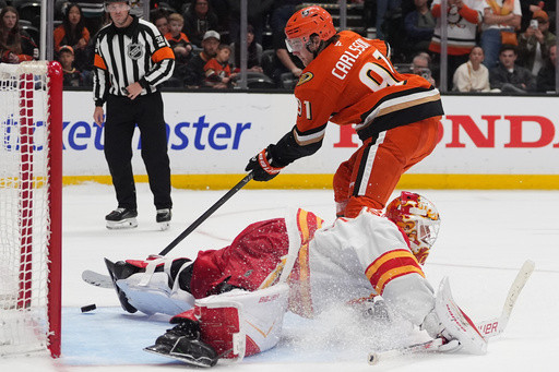 Gauthier scores 2 goals and Ducks edge Flames 3-2 in shootout for 8th straight home win