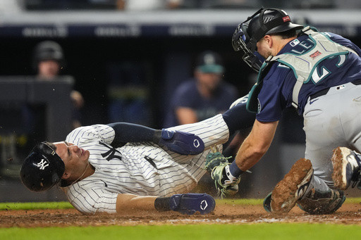 Yankees rally past Mariners 6-5 in 10 innings after going hitless against Bryan Woo until the 8th