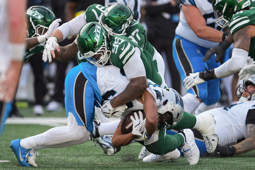 Cowboys make major move for beleaguered defense in trade for Quinnen Williams, AP sources say