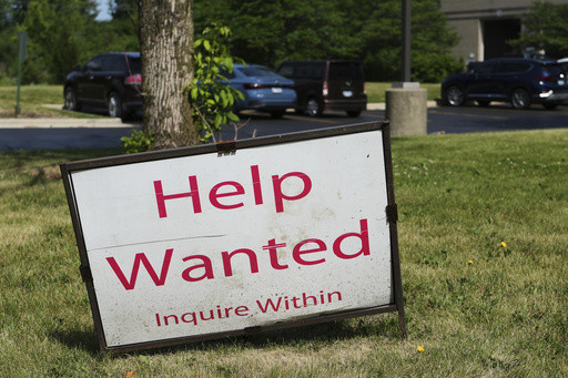 US job openings fell to 7.4 million last month as job market continues to cool