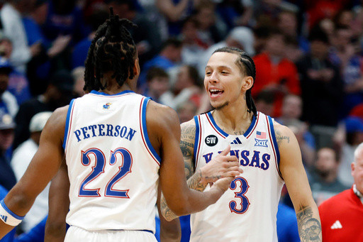 White scores 23 as No. 14 Kansas rebounds with 69-56 win over No. 5 Houston