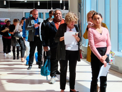 US unemployment claims fall again last week, remain at historically healthy level