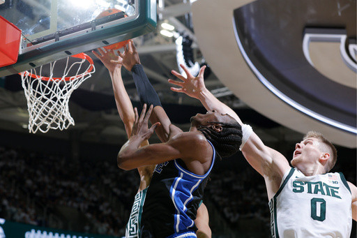 Cameron Boozer scores 18 in No. 4 Duke’s 66-60 win over No. 7 Michigan State