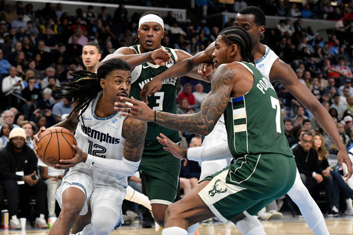 Jackson scores 24 points and Morant adds 17 in his return as the Grizzlies beat the Bucks 125-104