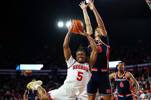 Wilkinson scores 31 points as high-scoring No. 23 Georgia tops Auburn 104-100 in OT
