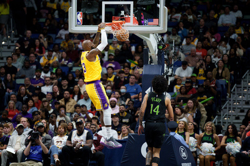 James and Doncic each score 30 to help the Lakers hold off the Pelicans 111-103