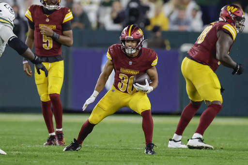 Commanders’ Austin Ekeler is out for the season with a torn Achilles tendon, AP source says
