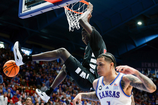 Thiam scores career-high 28 to lead Cincinnati to an 84-68 upset of No. 8 Kansas
