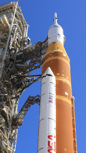 NASA will return its moon rocket to the hangar for more repairs before astronauts strap in