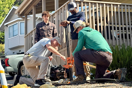 Investigators take soil samples outside home of a man convicted of killing Kristin Smart