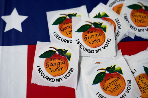 Justice Department seeks the names of 2020 election workers in Georgia’s Fulton County