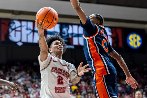 Alabama’s Aden Holloway, the Tide’s No. 2 scorer, is arrested on a felony drug charge