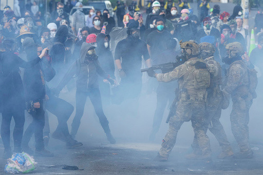Portland residents near ICE building win court order limiting agents’ tear gas use