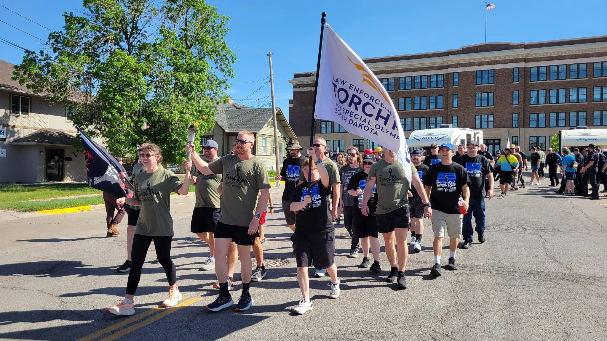 Rapid City Police Officers Carry the Torch for Special Olympics South Dakota