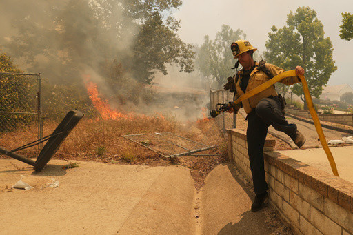 Thousands ordered to evacuate as Southern California wildfire threatens homes