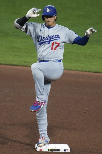 Dodgers star Shohei Ohtani, fighting an illness, has 2 hits after opting not to pitch vs. Pirates