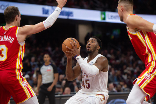 Donovan Mitchell scores 37 points as Cavaliers down Young-less Hawks 117-109