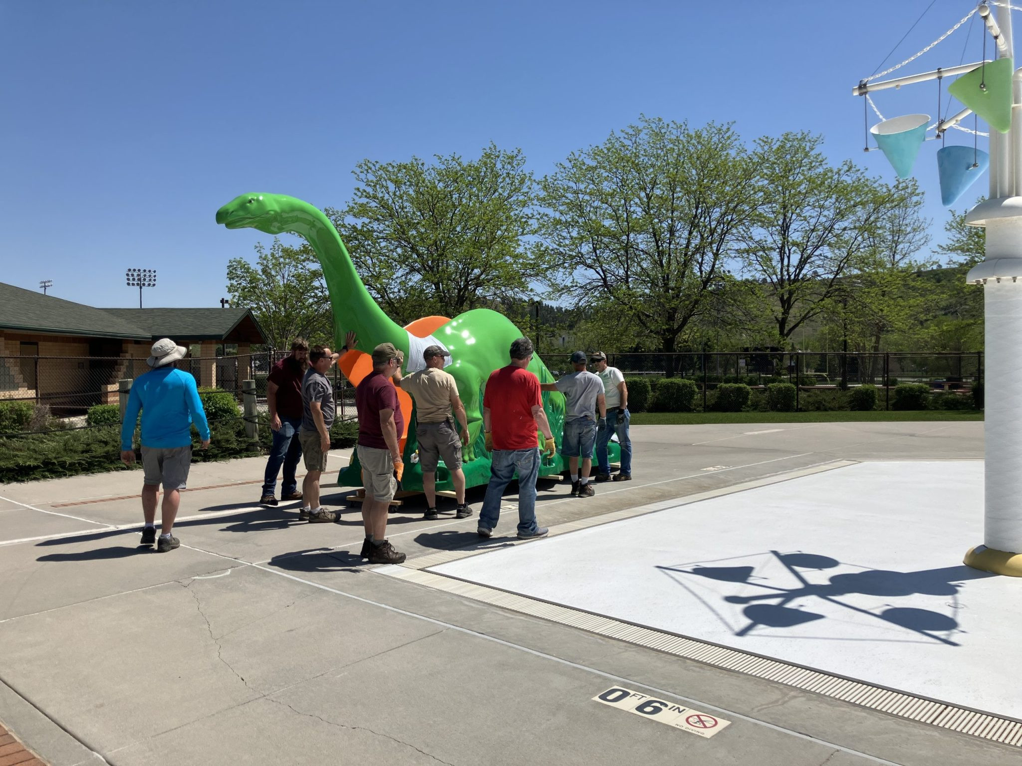 New Dinosaur Slide to Welcome Sioux Park Pool Swimmers This Season