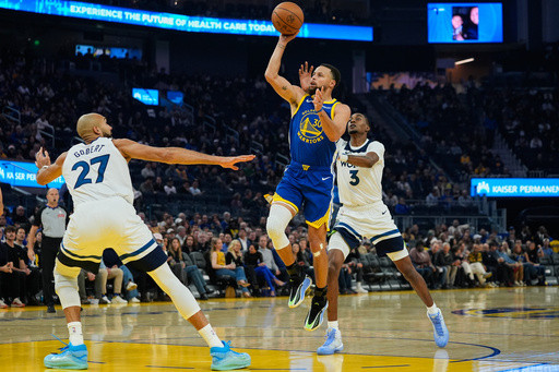 Curry scores 39 in return but Timberwolves top Warriors 127-120 without Edwards