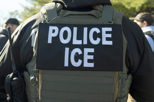 Migrants and ICE officers contend with heat, smog and illness after detoured South Sudan flight