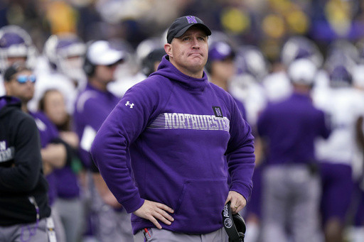 Northwestern reaches settlement with football coach who was fired amid hazing scandal