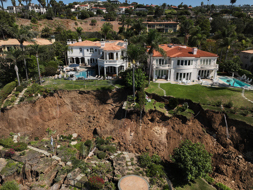 Hundreds of feet of coastal bluff in California fell toward the ocean in landslide-stricken town