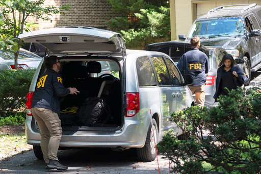 FBI seized phones, computer equipment, folders during search of Bolton’s home, records show